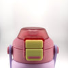 Pink and purple water bottle with a yellow cap on a white background